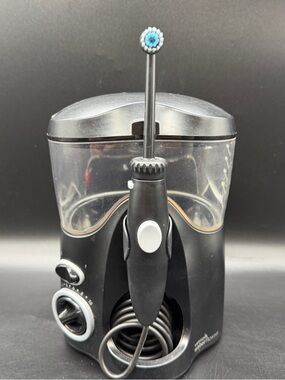 Waterpik Water Flosser Black WP-112W Oral Irrigator Multiple Tips Tested 20 Oz